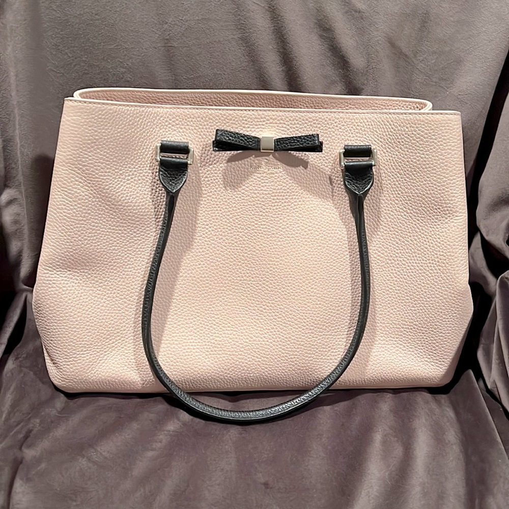 New without tags Kate Spade pink purse with black bow and handles